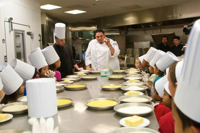 Chef Crisafulli instructs a group of first grade students from ...